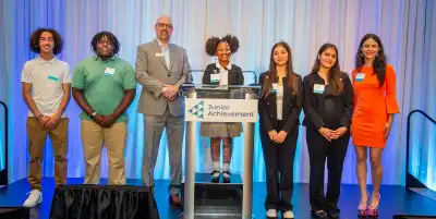Student speakers gather at the 2025 Partners in Achievement Breakfast